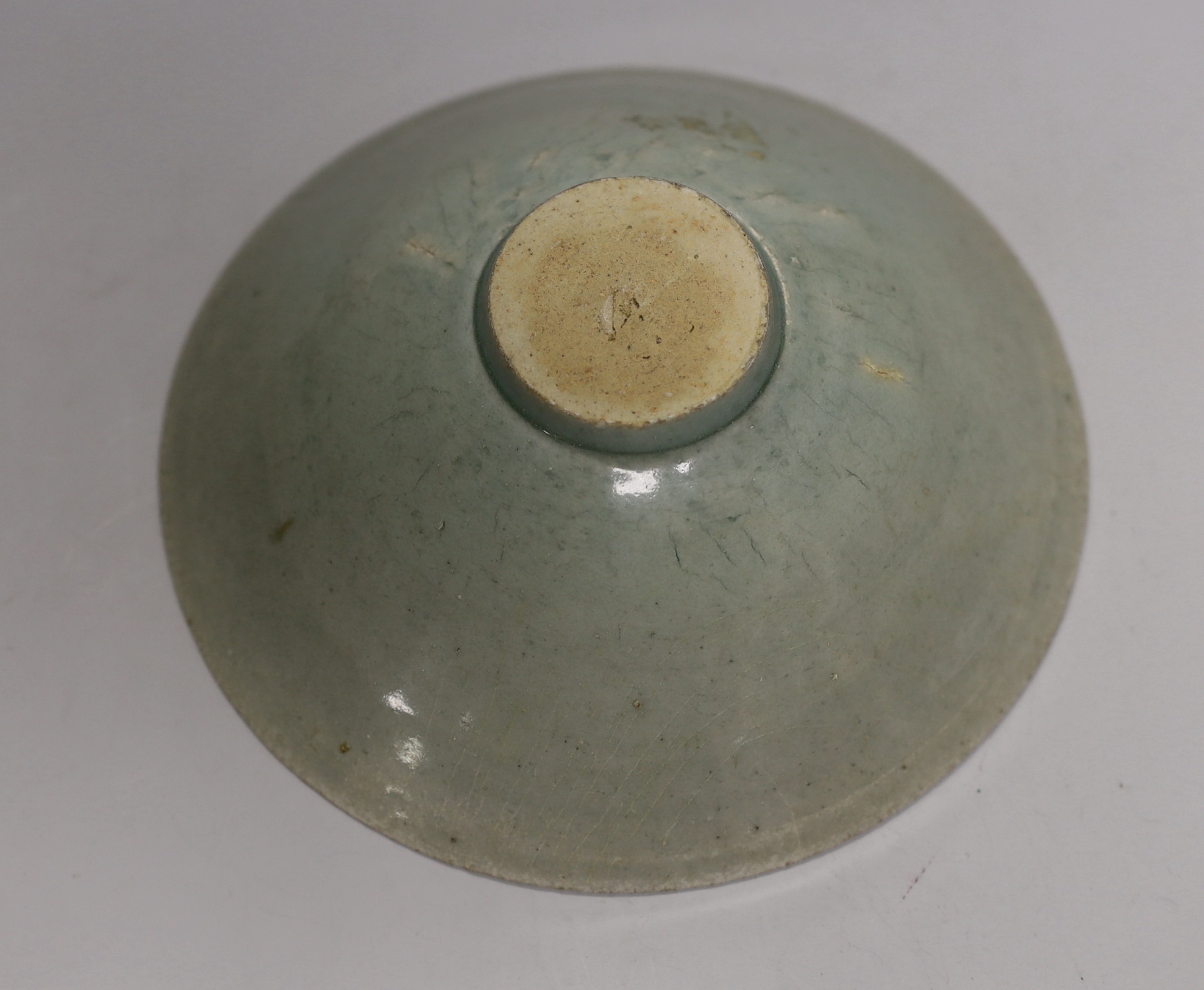 A Chinese celadon bowl, 17cm diameter